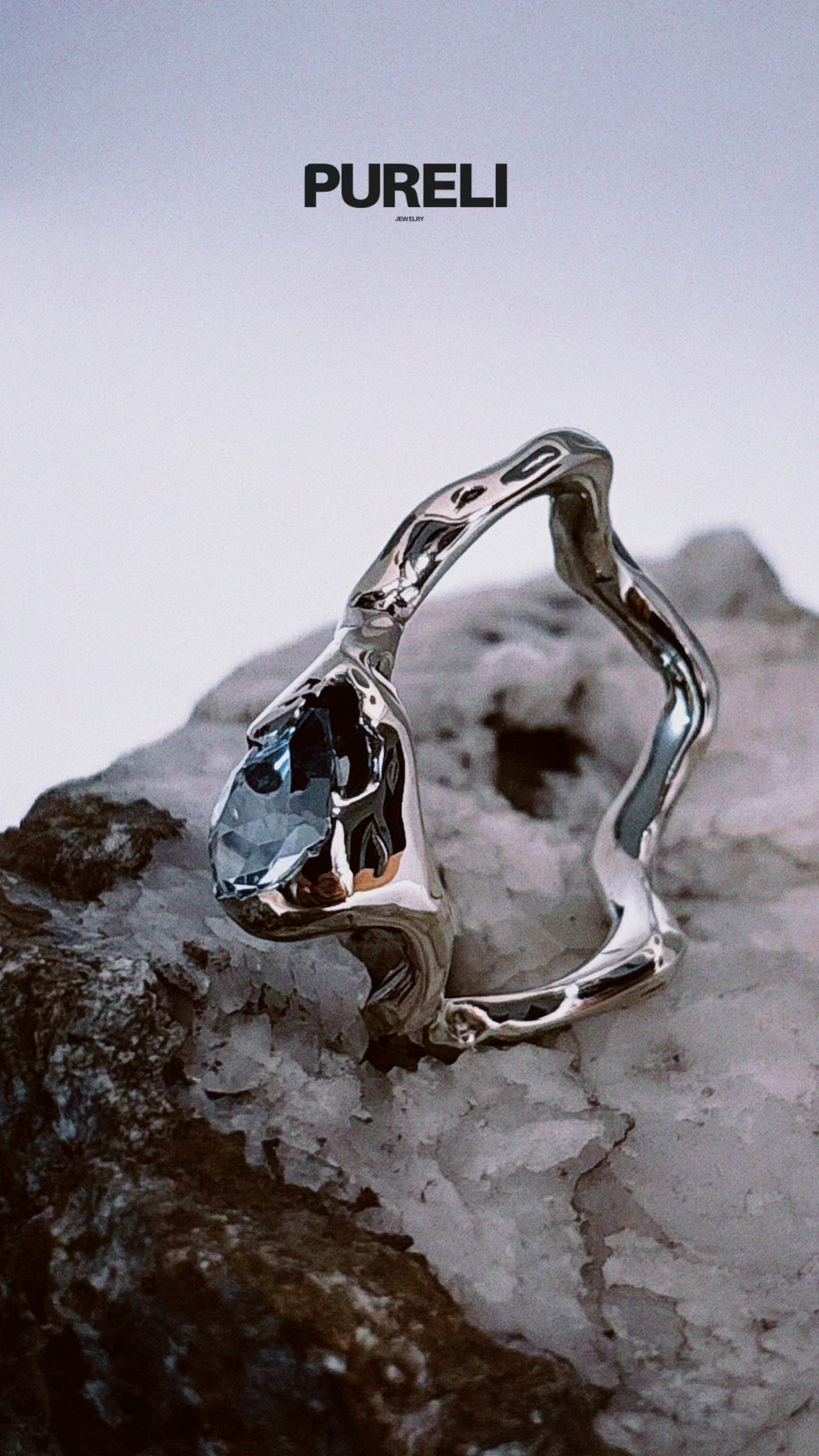 Azure Silver pleated ring with blue topaz